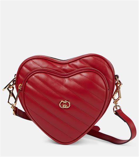 gucci purse heart on back|Gucci interlocking gg shoulder bag.